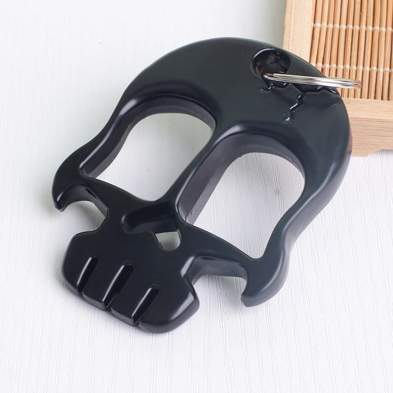 Double-fingered brass knuckles