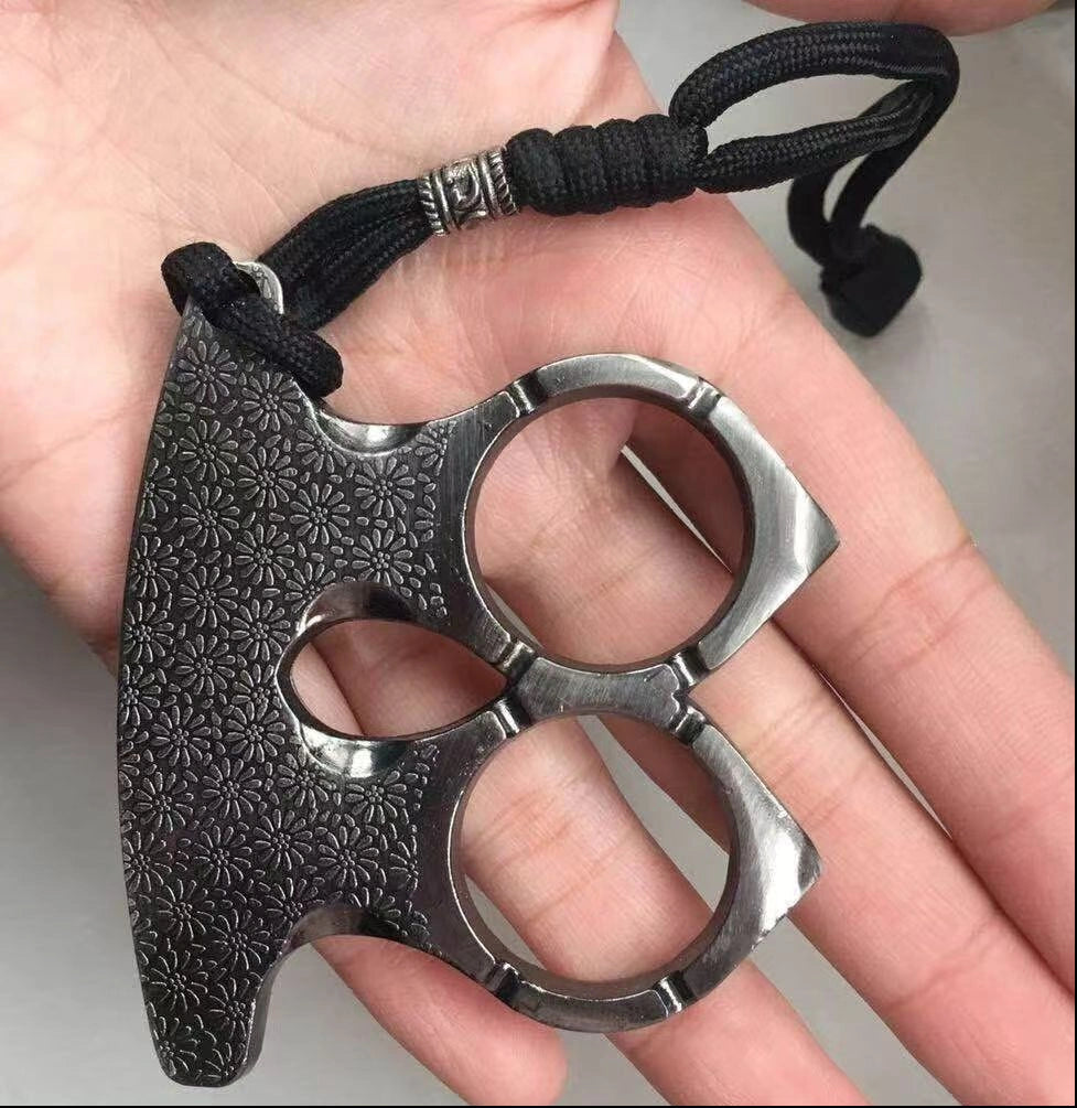 Self-defense brass knuckles