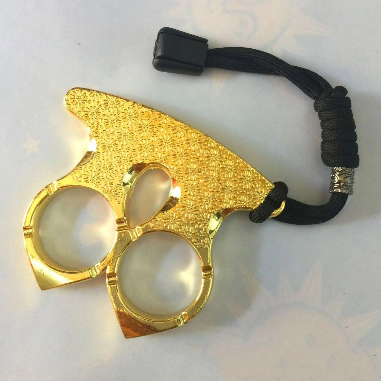 Self-defense brass knuckles