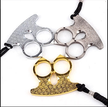 Self-defense brass knuckles