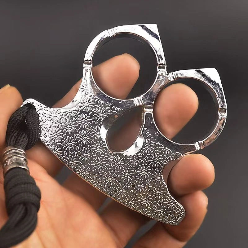 Self-defense brass knuckles